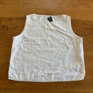 Eileen Fisher white cotton shell top with high neck and side slits. Size PS.